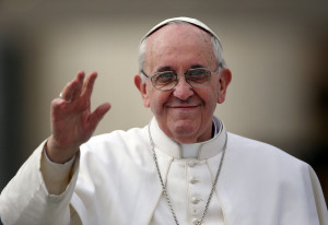 VATICAN CITY, VATICAN - MARCH 27:  Pope Francis waves to the crowd as he drives around St Peter's Square ahead of his first weekly general audience as pope on March 27, 2013 in Vatican City, Vatican. Pope Francis held his weekly general audience in St Peter's Square today  (Photo by Christopher Furlong/Getty Images)